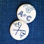 Inspired by history and nostalgia for their DC college days, Chris and Alison created these vintage inspired hand drawn button favors.